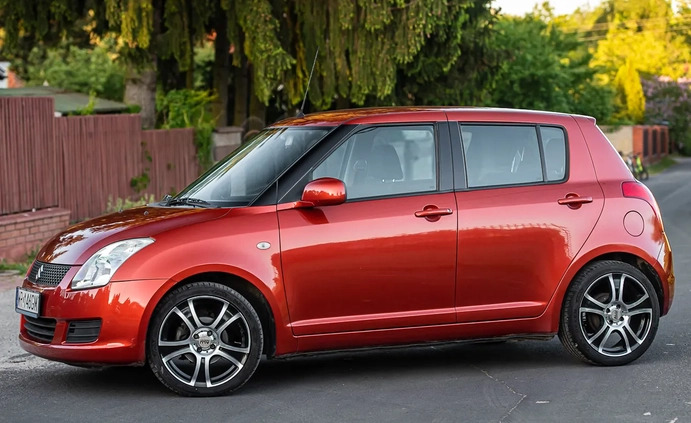 Suzuki Swift cena 18900 przebieg: 136000, rok produkcji 2009 z Rymanów małe 407